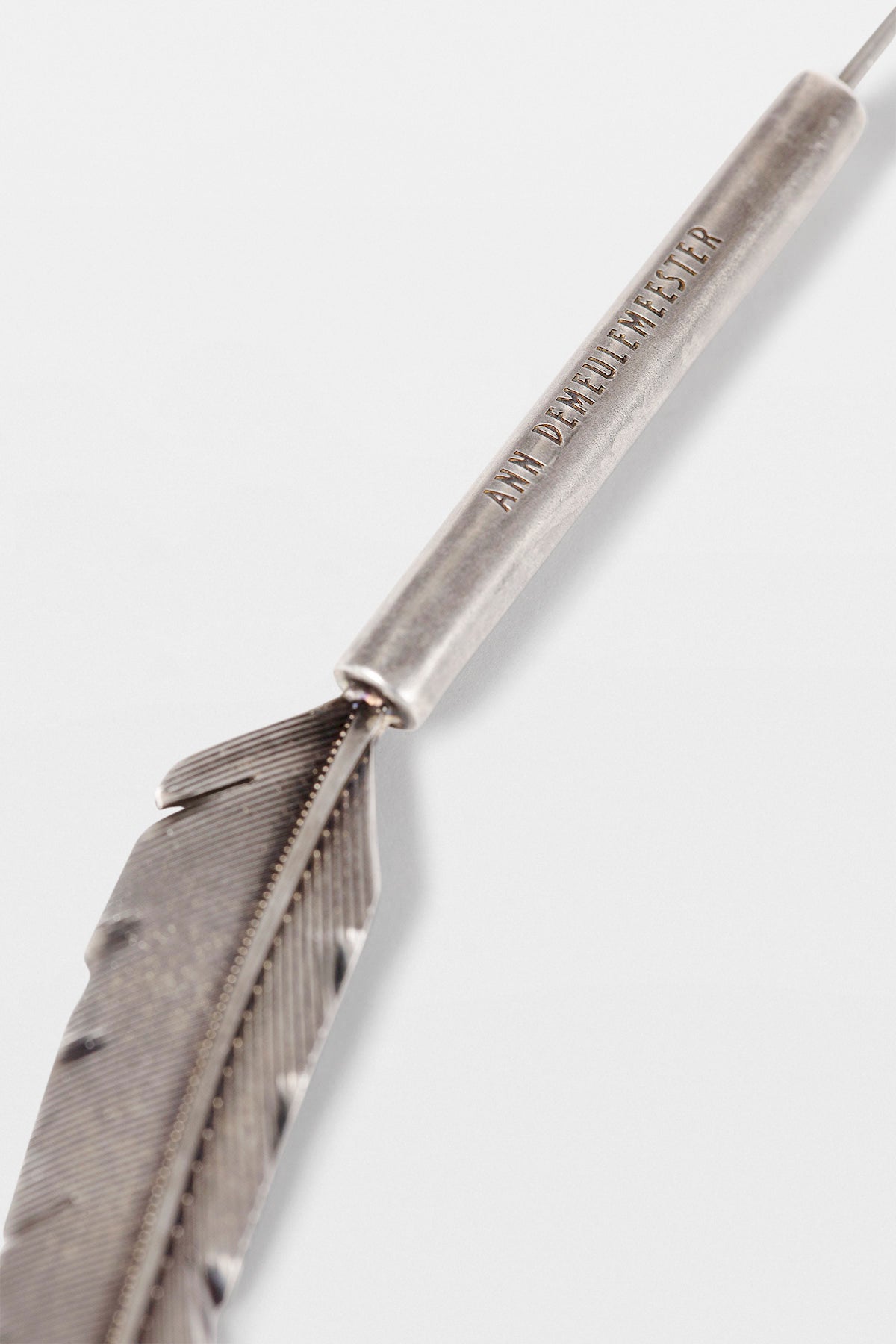 Boucle d'oreille plume Mies 