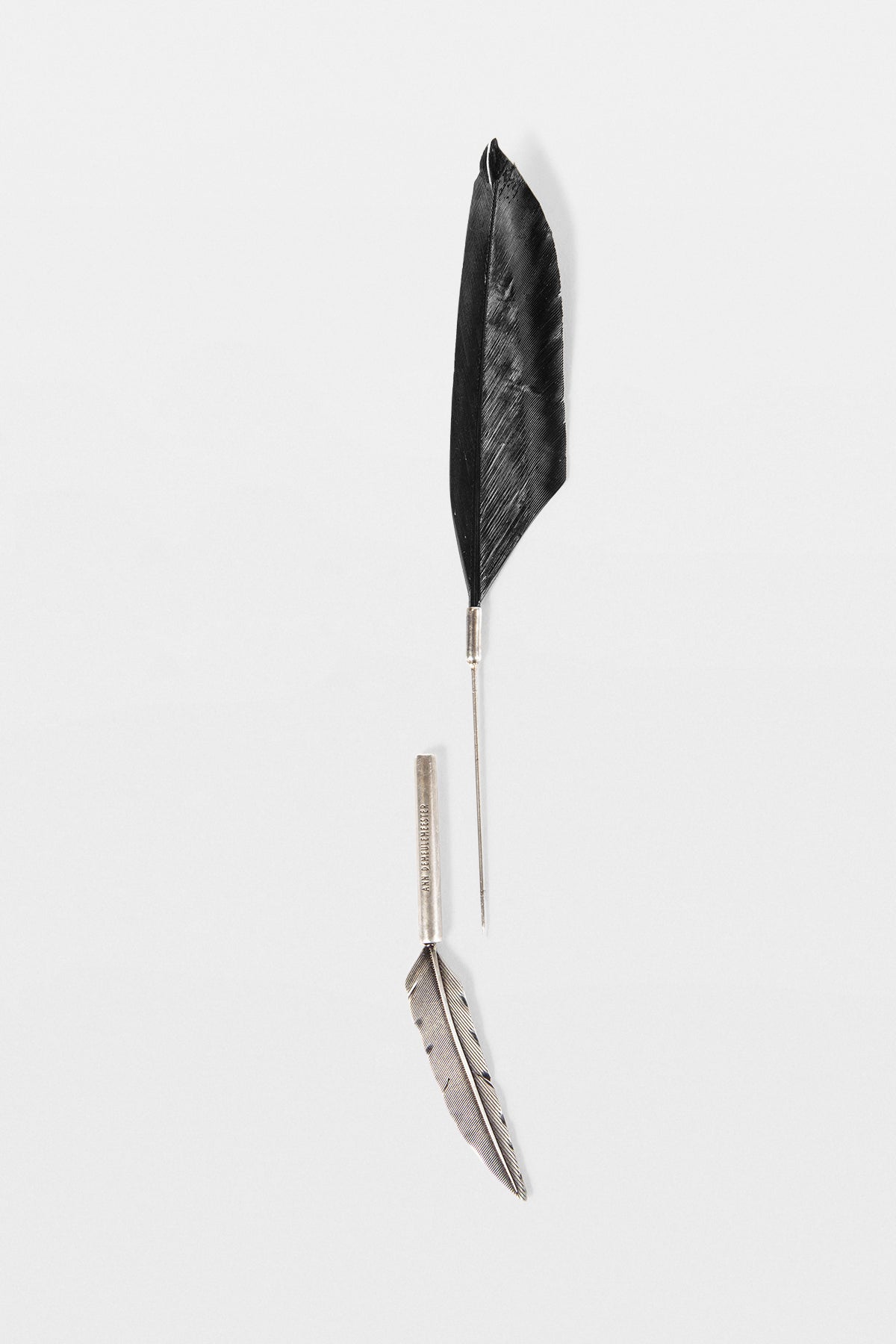 Boucle d'oreille plume Mies 
