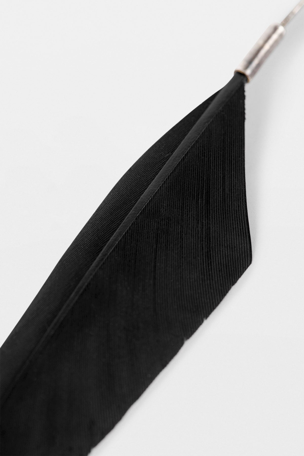 Boucle d'oreille plume Mies 