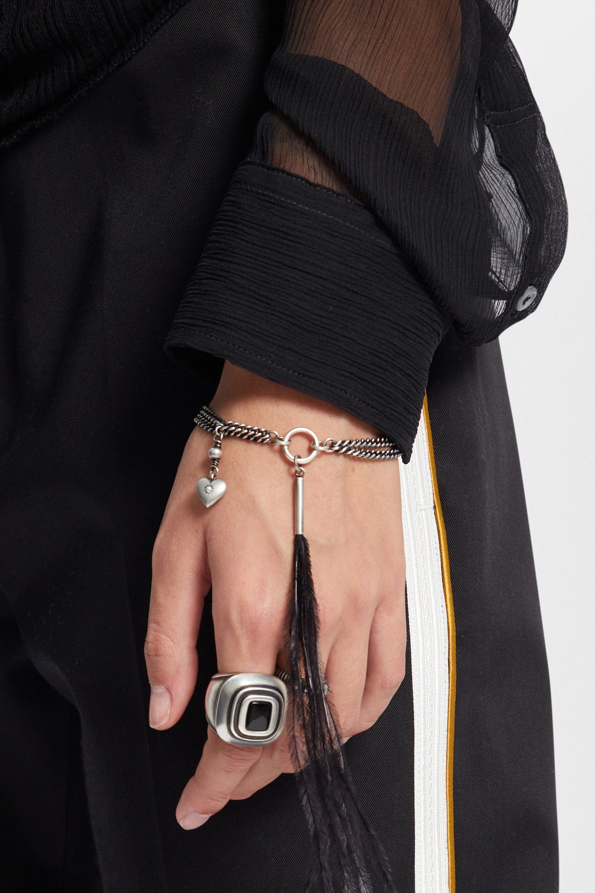 Revi-Armband mit Feder- und Herzanhängern 